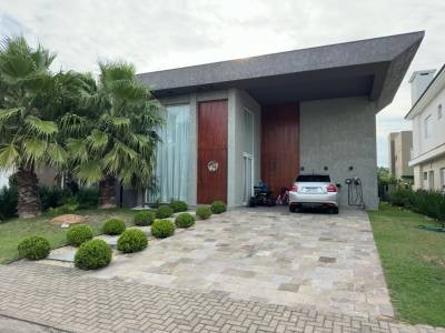 Imagem do imóvel Casa em condomínio 4 dormitórios à venda, Arco Iris em Capão Da Canoa referência 540